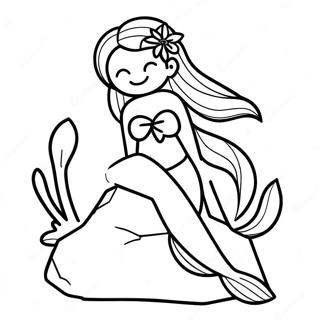 岩に座るエレガントな人魚の塗り絵 ぬりえ